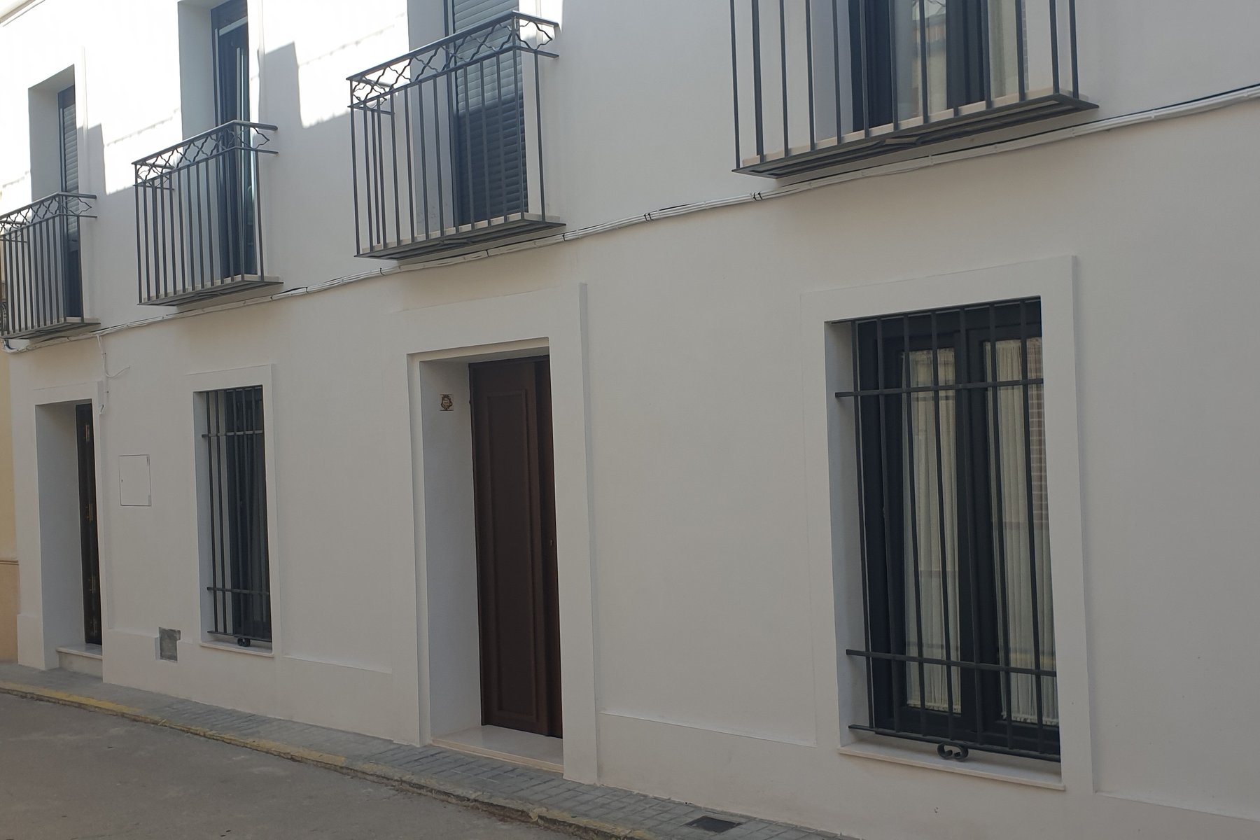 REFORMA Y AMPLIACIÓN VIVIENDA UNIFAMILIAR ENTREMEDIANERAS · undefined, Marchena (Sevilla) — fachada