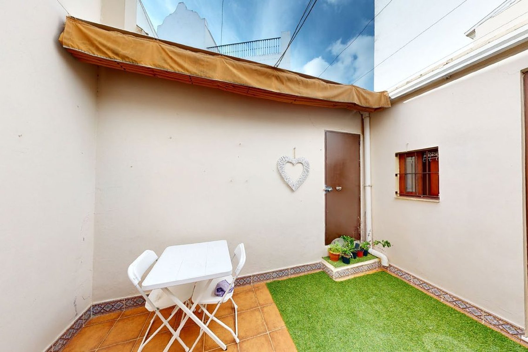 AFO VIVIENDA UNIFAMILIAR ENTREMEDIANERAS · Sastres 10A, Marchena (Sevilla) — patio