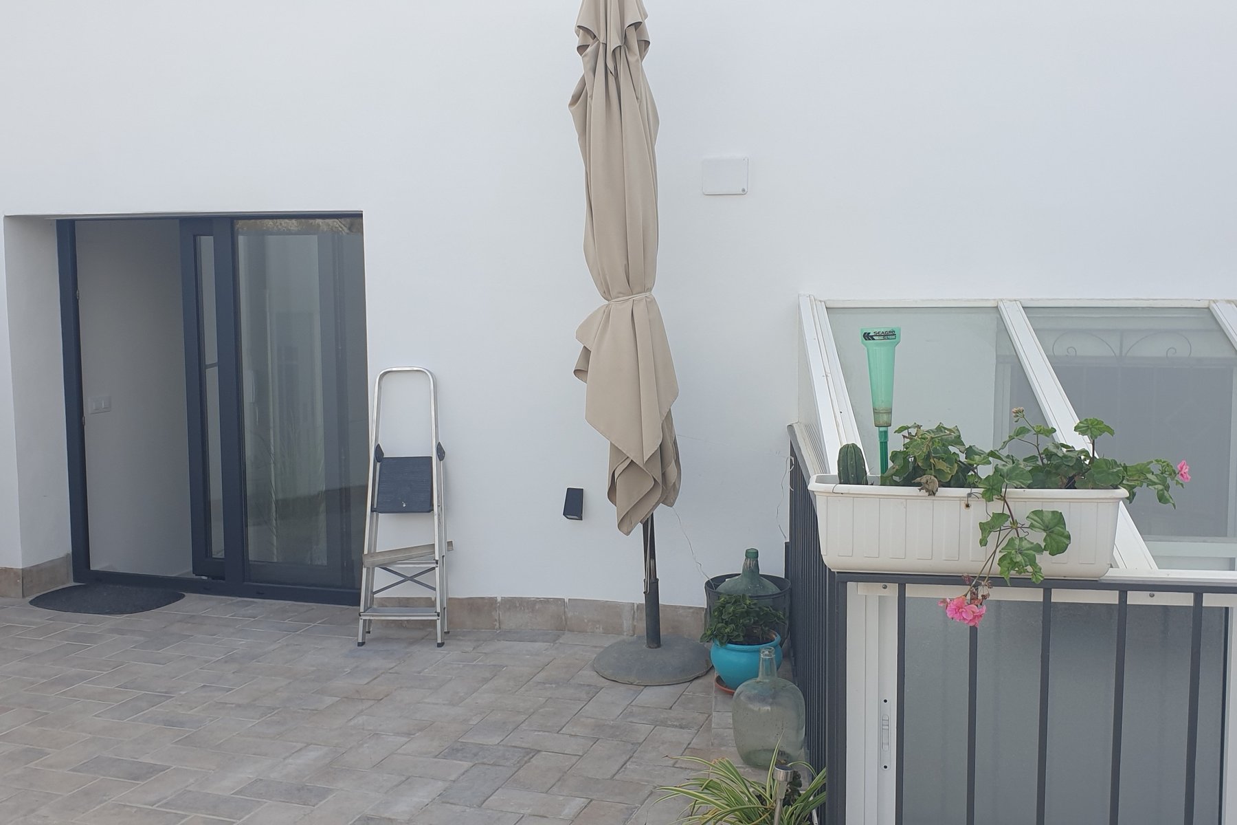 REFORMA Y AMPLIACIÓN VIVIENDA UNIFAMILIAR ENTREMEDIANERAS · undefined, Marchena (Sevilla) — azotea y lucernario